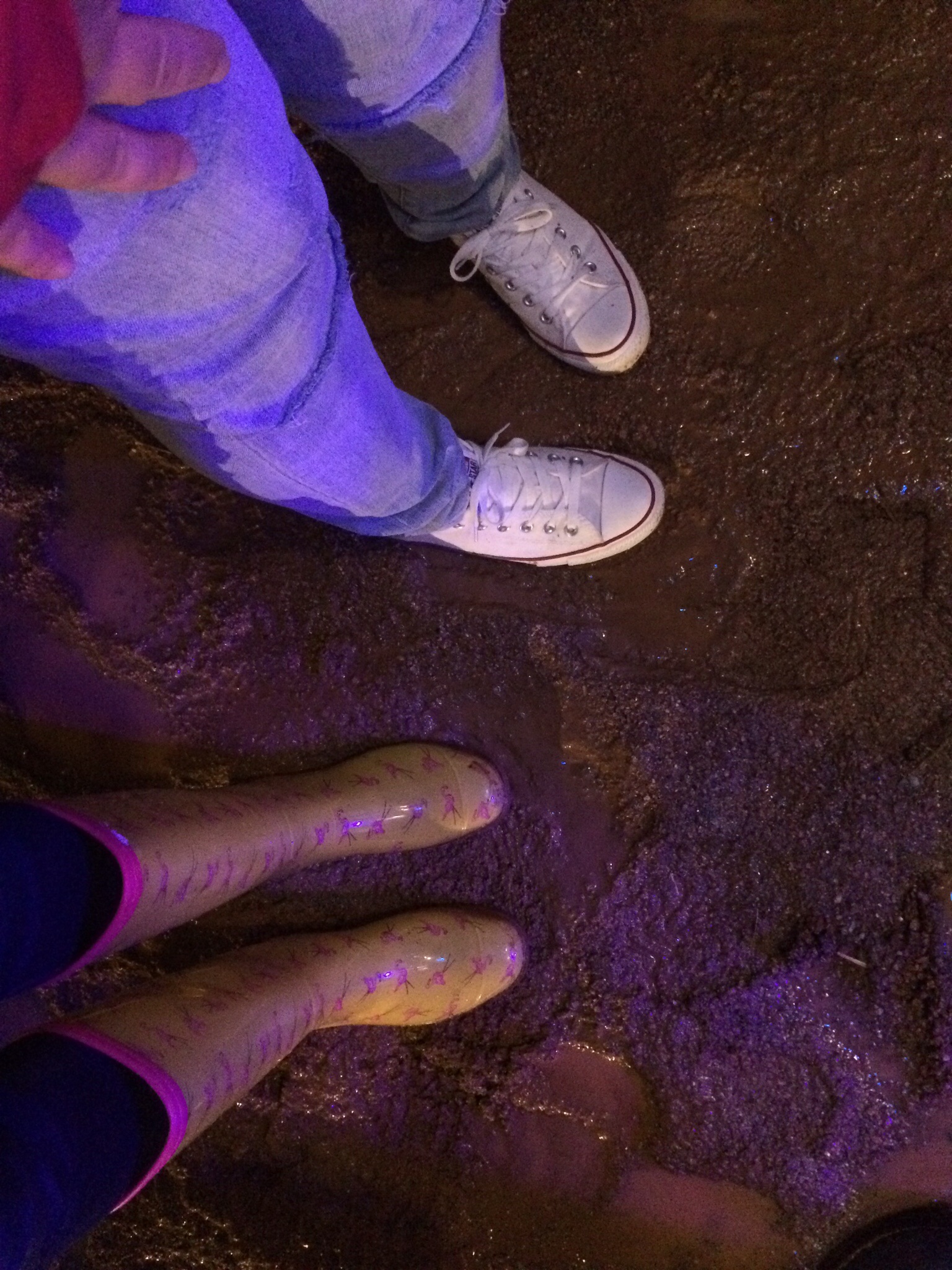 The mud we were standing in--at least I'm in rain boots!